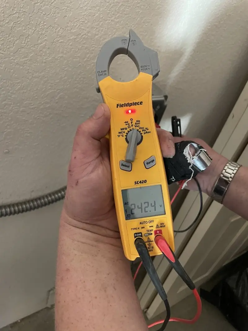 Voltage testing with clamp meter during Generator Installation in Rosedale